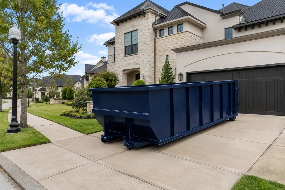 Roll-off dumpster on a Cypress, TX driveway